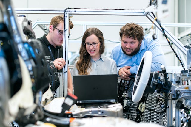 automotive engineers in workshop