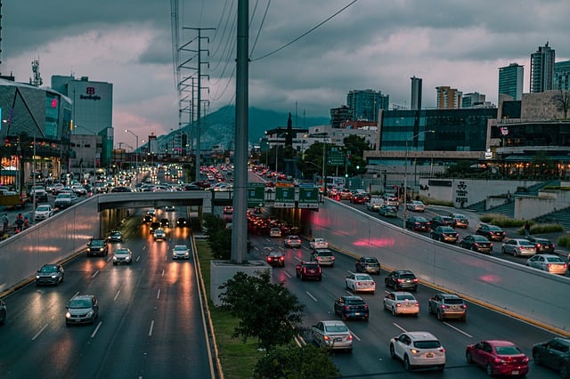 A highway in a city with cars going under and overpass